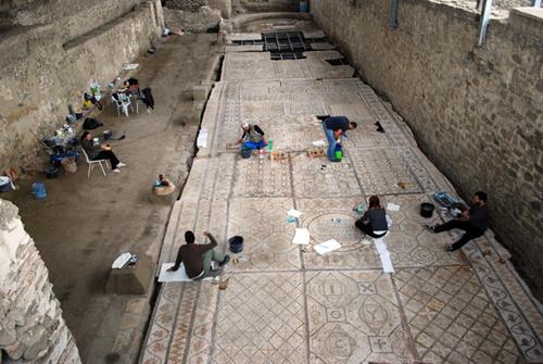 The mosaic from the Old Episcopal Basilica placed back in its original position